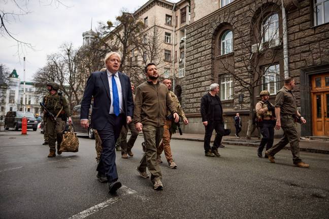 The President of Ukraine - Volodymyr Zelenskyy walks with Prime Minister of the United Kingdom - Boris Johnson through the streets of Kyiv with security forces. Credit: Alamy