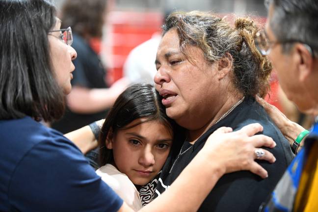 Families grieve in Uvalde. Credit: Bob Daemmrich / Alamy Stock Photo