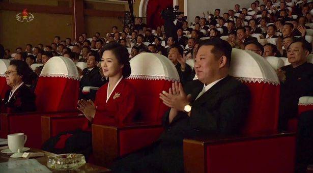 Kim Jong-un sitting next to his wife Ri Sol-ju (centre) and his aunt Kim Kyong-hui (left) Credit: KRT