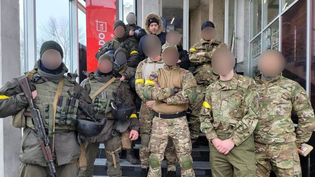 Ben Spann with men in military uniform. Credit: Sky News/Twitter
