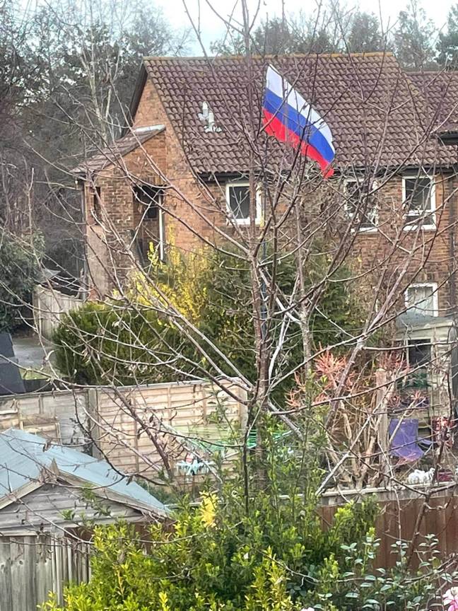 Woman flies Russian flag in UK (Kennedy News and Media)