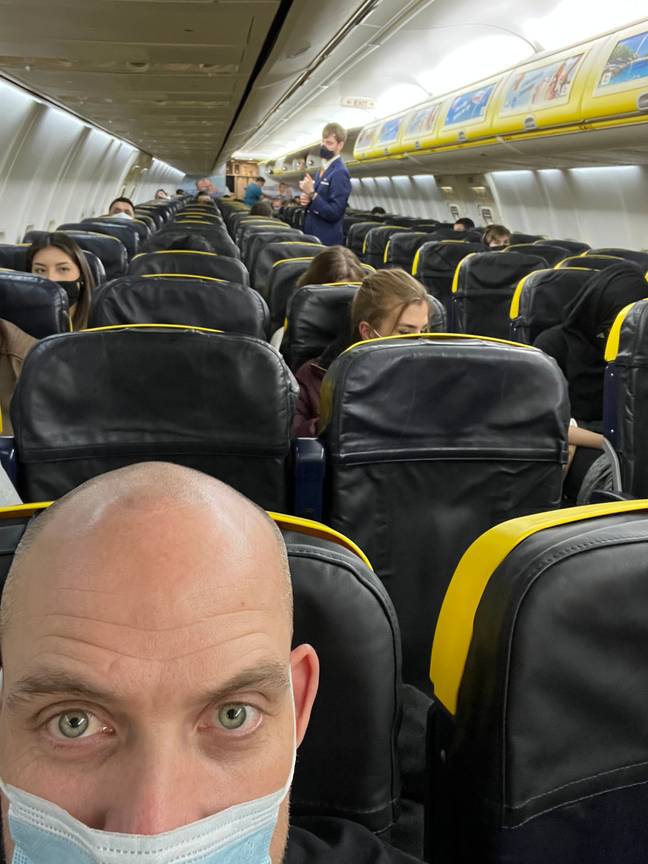 Simon on board the Ryanair flight. Credit: MEN Media