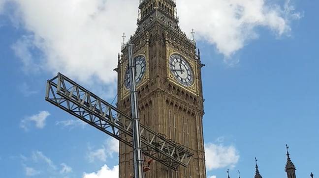 The huge piece of scaffolding collided with the famous clock tower following five years of very expensive restoration work. Credit: SWNS