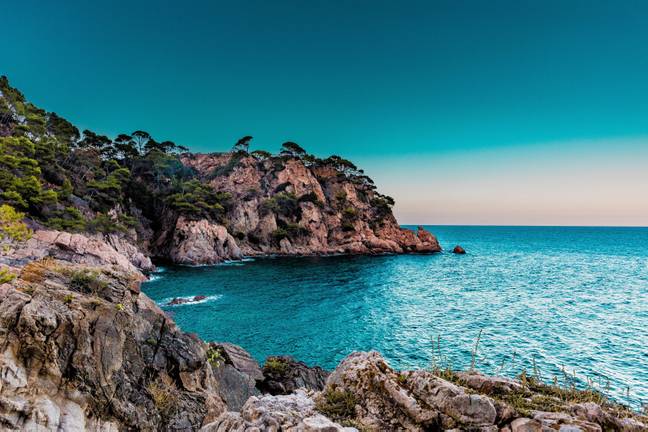 In Spain, holidaymakers also risk being fined if they are caught urinating in the ocean.  Credit: Unsplash.