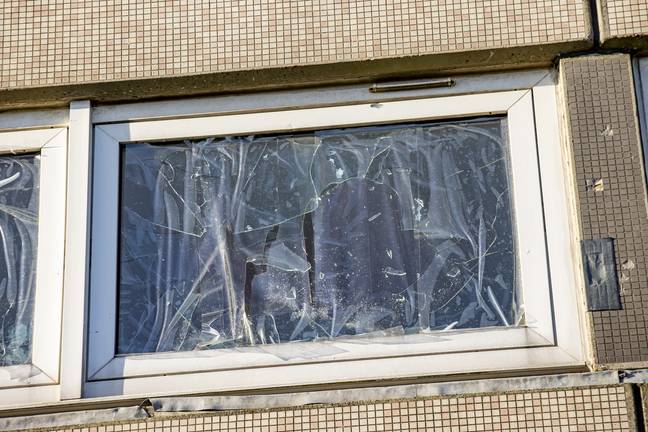 The broken windows of the tower block. Credit: BPM Media