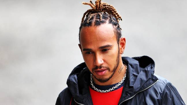 Lewis Hamilton is often seen wearing a nose stud. Credit: Alamy