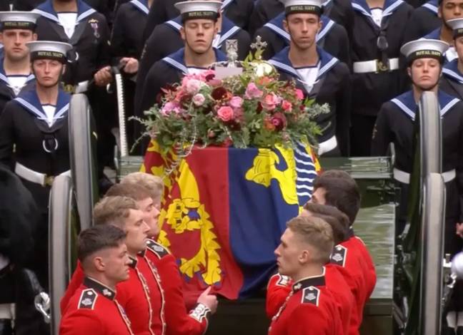 The pallbearers waiting before carrying Queen Elizabeth II's coffin. Credit: BBC