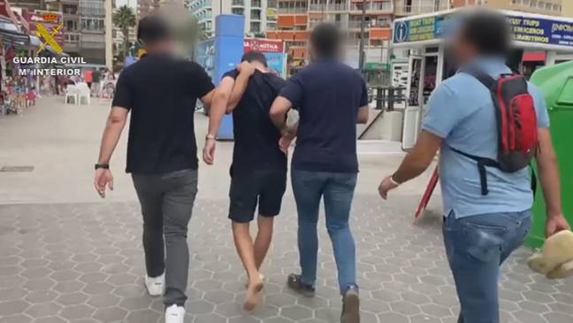 Officers led the man barefoot through Benidorm after his arrest. Credit: Newsflash