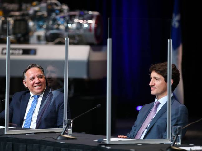 Quebec premier Francois Legault looks over at Canada's Prime Minister Justin Trudeau. (Alamy)