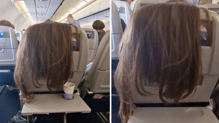Woman slammed as 'inconsiderate' after draping hair over back of plane chair