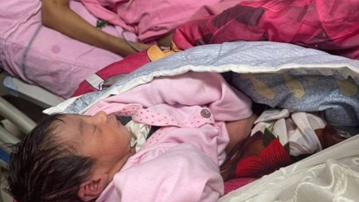 Woman who's been in a coma for seven months gives birth to healthy baby girl