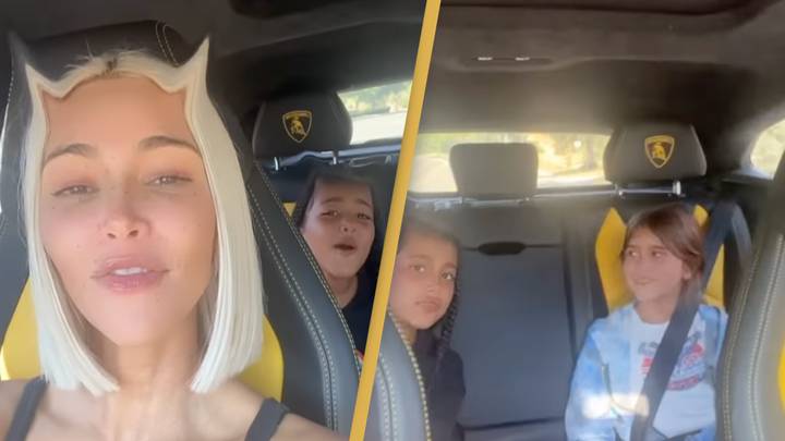 Kim Kardashian is being slammed for filming while driving with children in the car