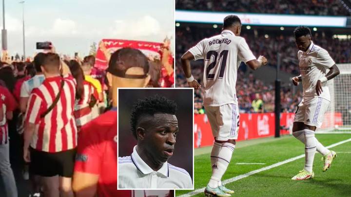 Atletico Madrid fans chant 'Vinicius is a monkey' while one holds up a vile racist doll ahead of Real Madrid clash