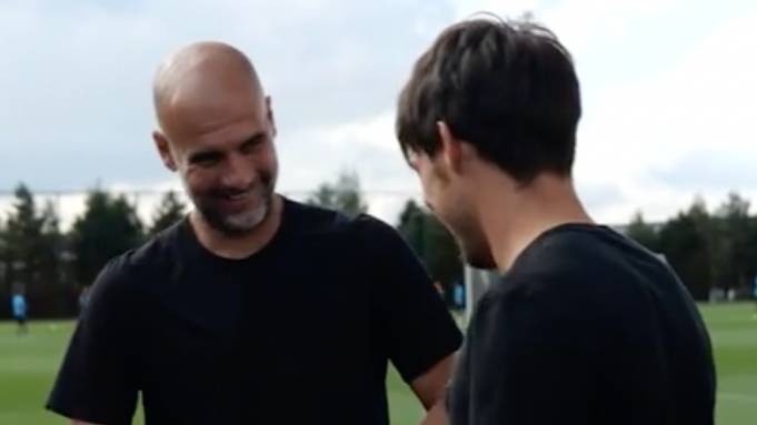 Pep Guardiola and David Silva laugh and joke at Manchester United's expense in Manchester City reunion