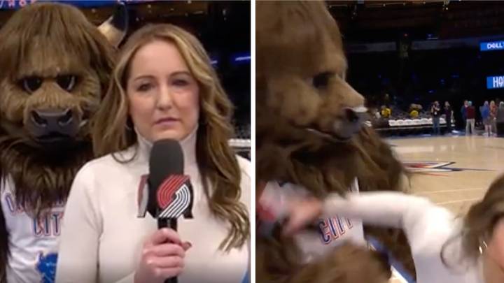 Reporter gets startled by creepy mascot, she hits him with her microphone