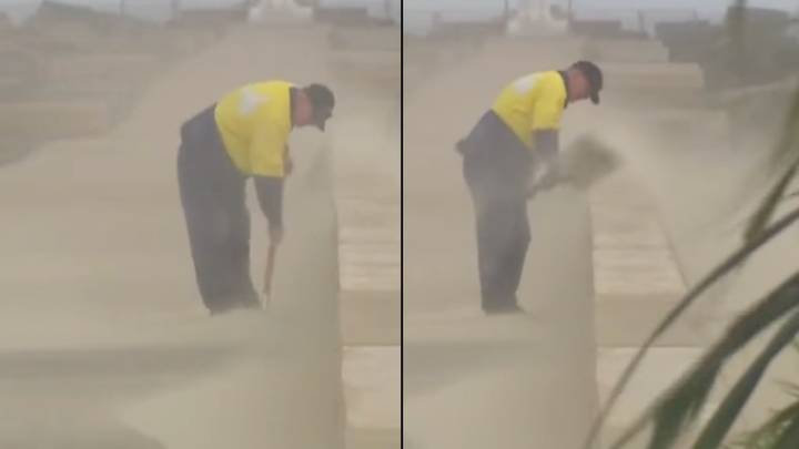 Aussie Council Worker Seen Shovelling Sand During Gale Force Winds