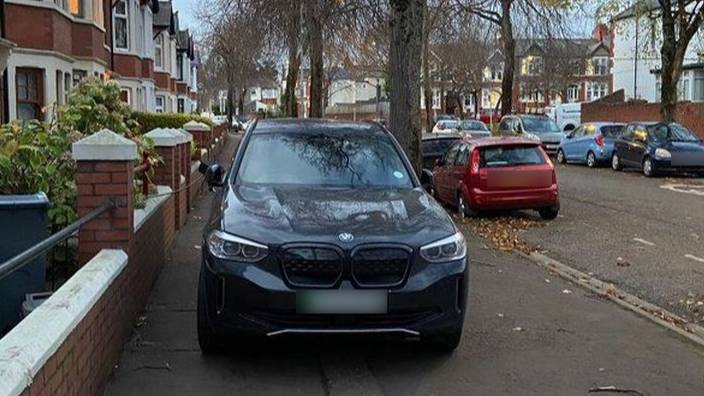 Electric Car Owner Sparks Debate After Parking On Pavement