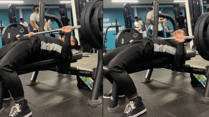 Guy Demonstrates Why You Should Never Use Weight Clips When Benching Alone