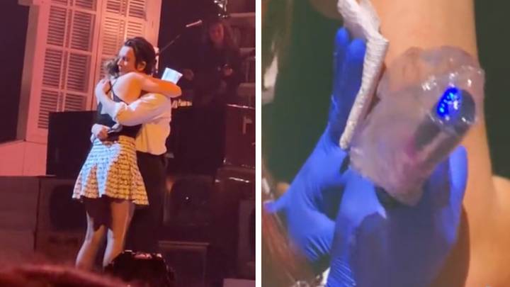 The 1975's Matty Healy brings fan on stage to get a tattoo