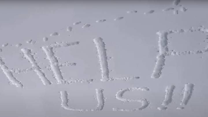 Residents write 'help us' in the snow as deadly weather hits the US