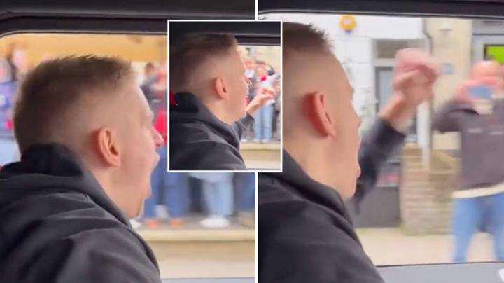 Oleksandr Zinchenko celebrated with Arsenal fans as he drove past them