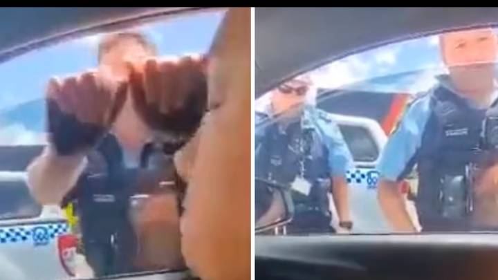 Moment police smash window after woman refused to leave her car
