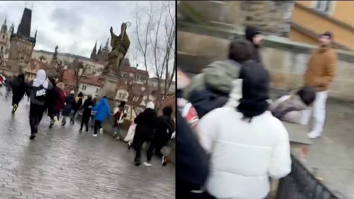 Locals run to safety over Prague's iconic Charles Bridge after school shooting leaves several dead