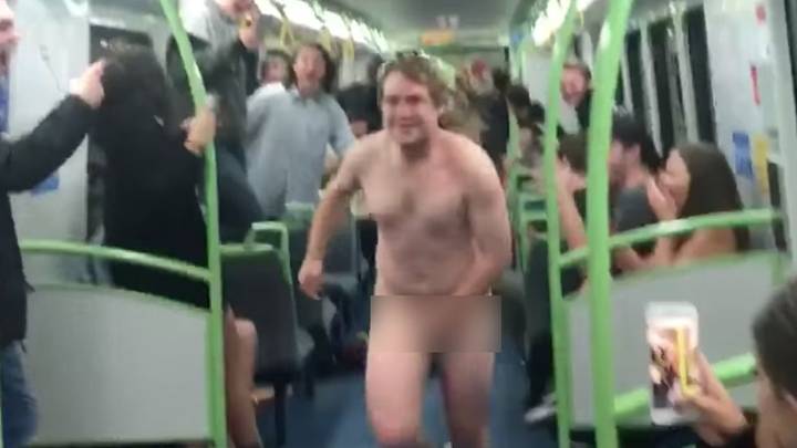Naked Man With Mullet Filmed Sliding Down Train Carriage 