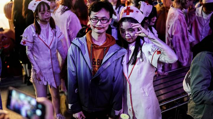Huge Crowds Gather For Halloween Event At Amusement Park In Wuhan