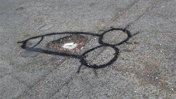 ​Potholes Gets Fixed After Protestor Spray-Paints Penises Around Them