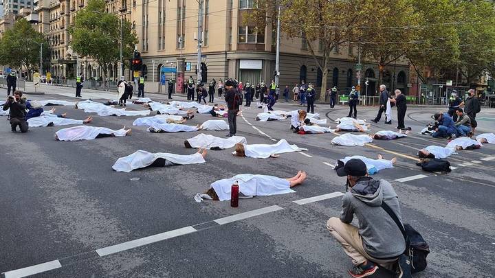 Extinction Rebellion Protestors 'Lie Dead' On Busy Melbourne Road For Climate Rally