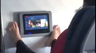 Twitter Users Go In On Plane Passenger For Using Feet To Swipe TV Screen 