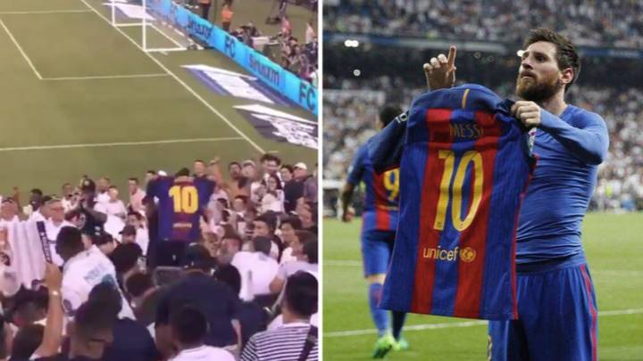 Barcelona Fan Holds Up Lionel Messi Shirt In Real Madrid Section