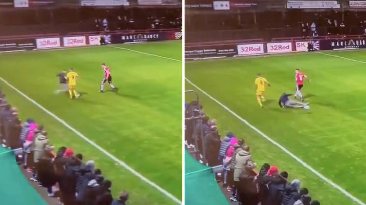 Fan Runs Onto The Pitch In Altrincham Vs Solihull Game And Produces Incredible Slide Tackle