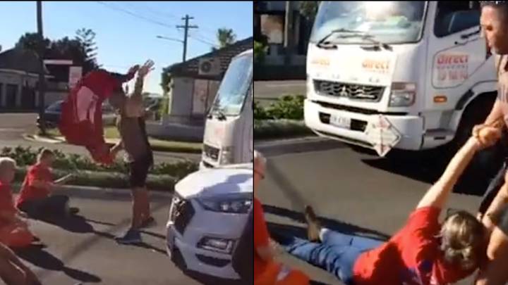 Angry Driver Drags Protester Away From Road She Was Blocking