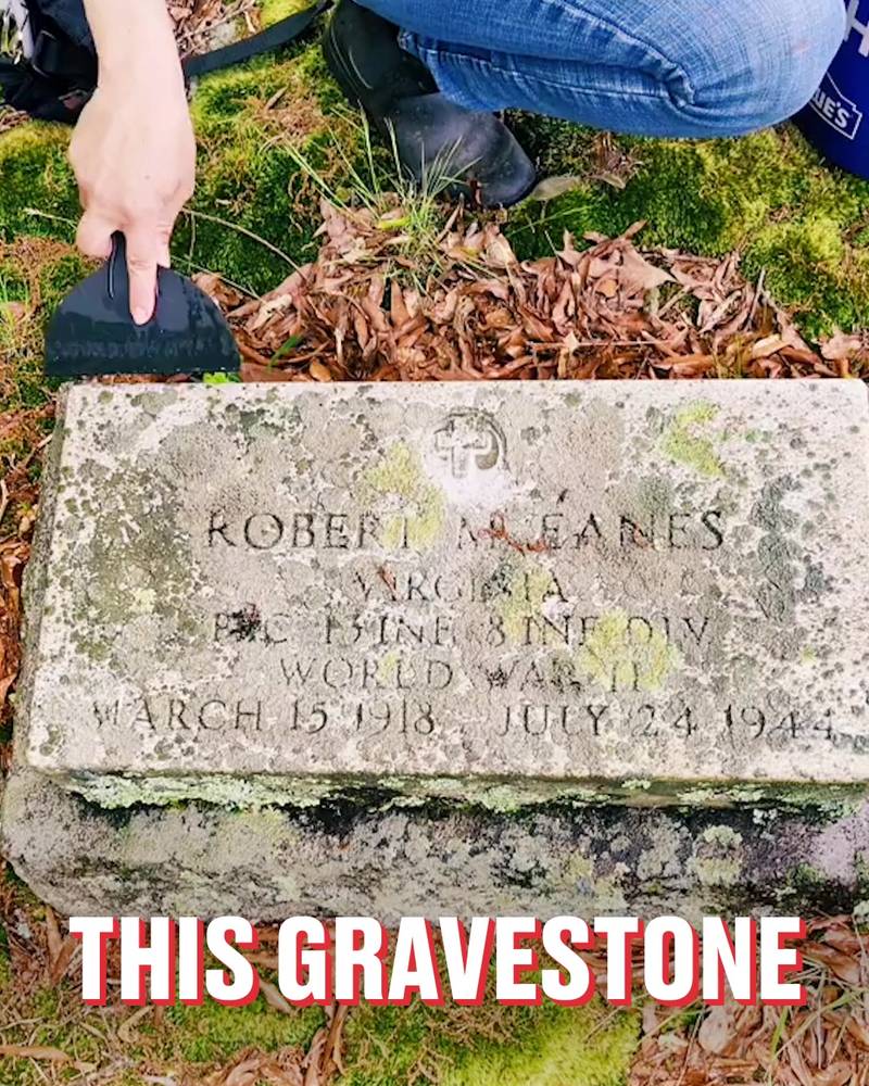 Cleaning a soldier's gravestone