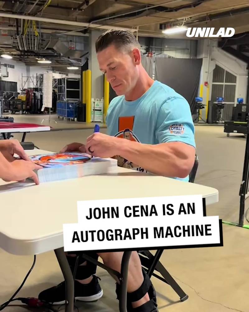 John Cena is an autographing machine