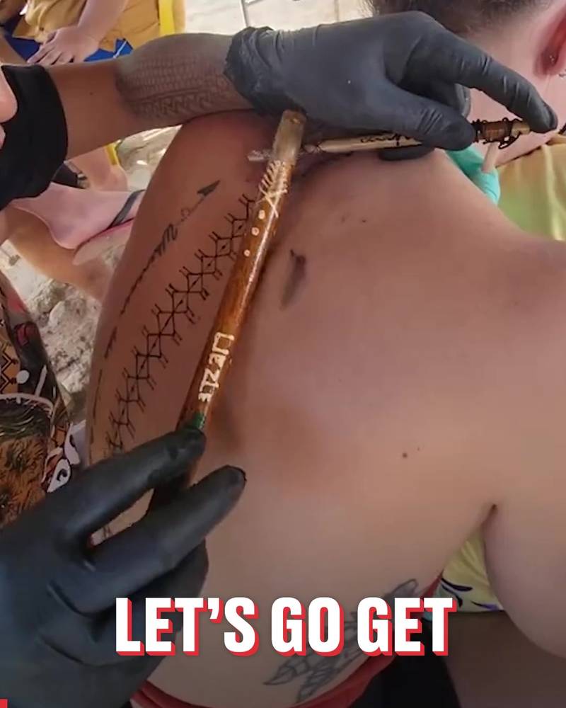 Getting a traditional village tattoo