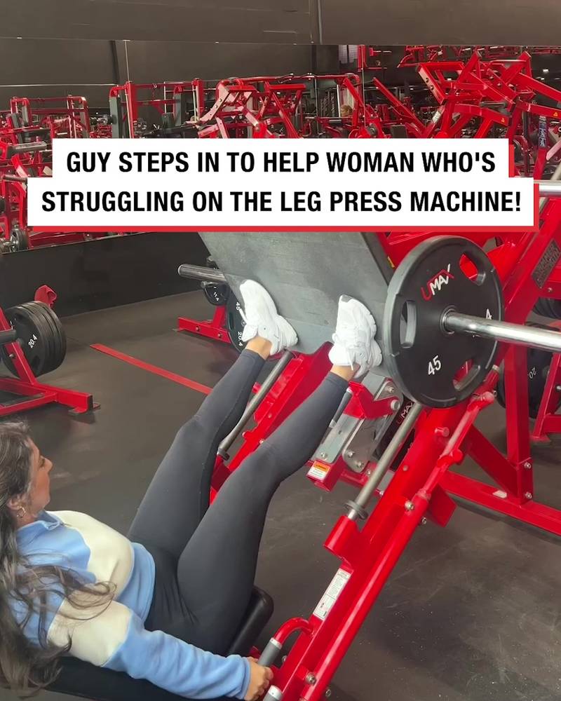 Guy steps in to 'help' a woman that is struggling on the leg press machine