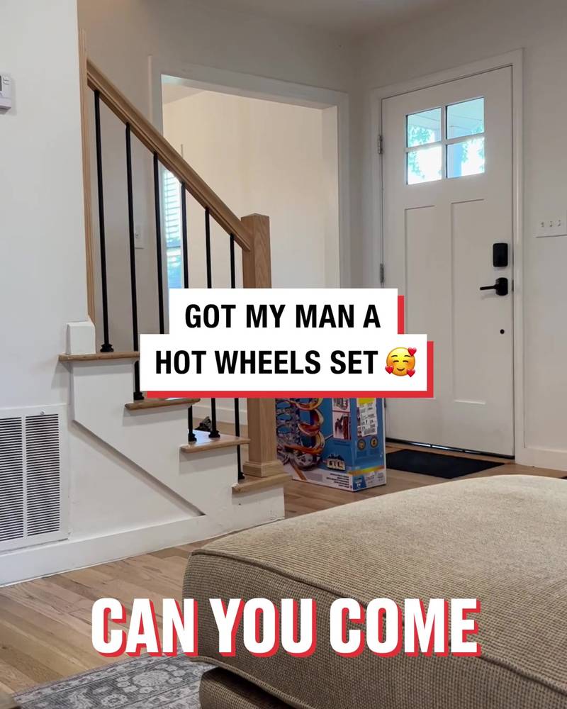 Guy is super happy to get his Hot Wheels set