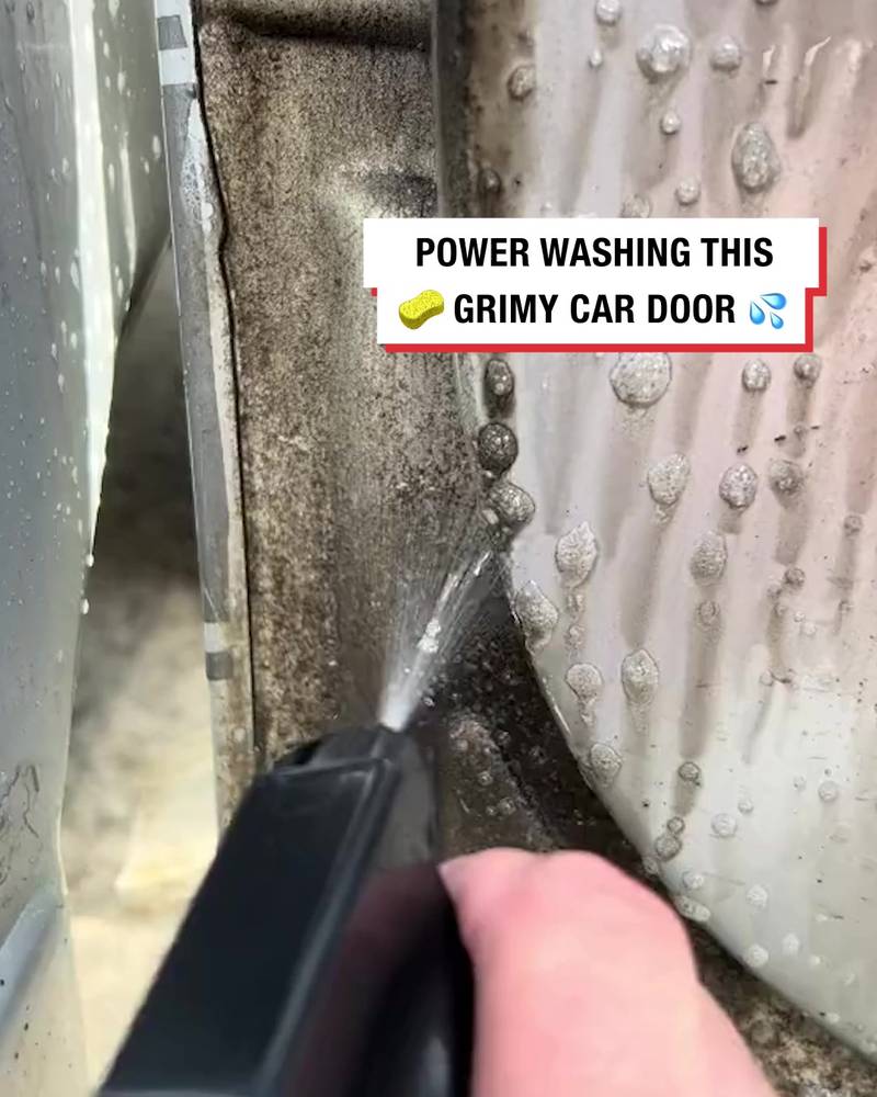 Power washing dirty door jamb