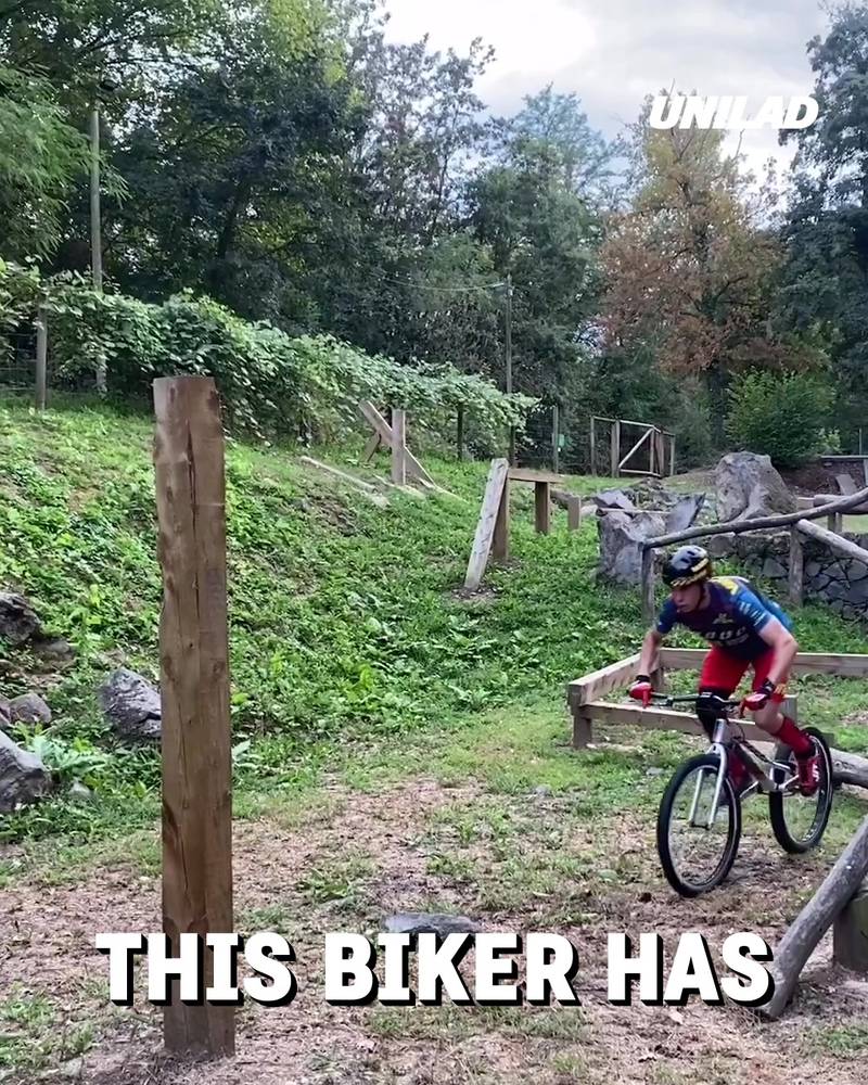 Bike rider can balance on anything