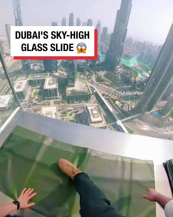 Riding a 520m-high glass slide
