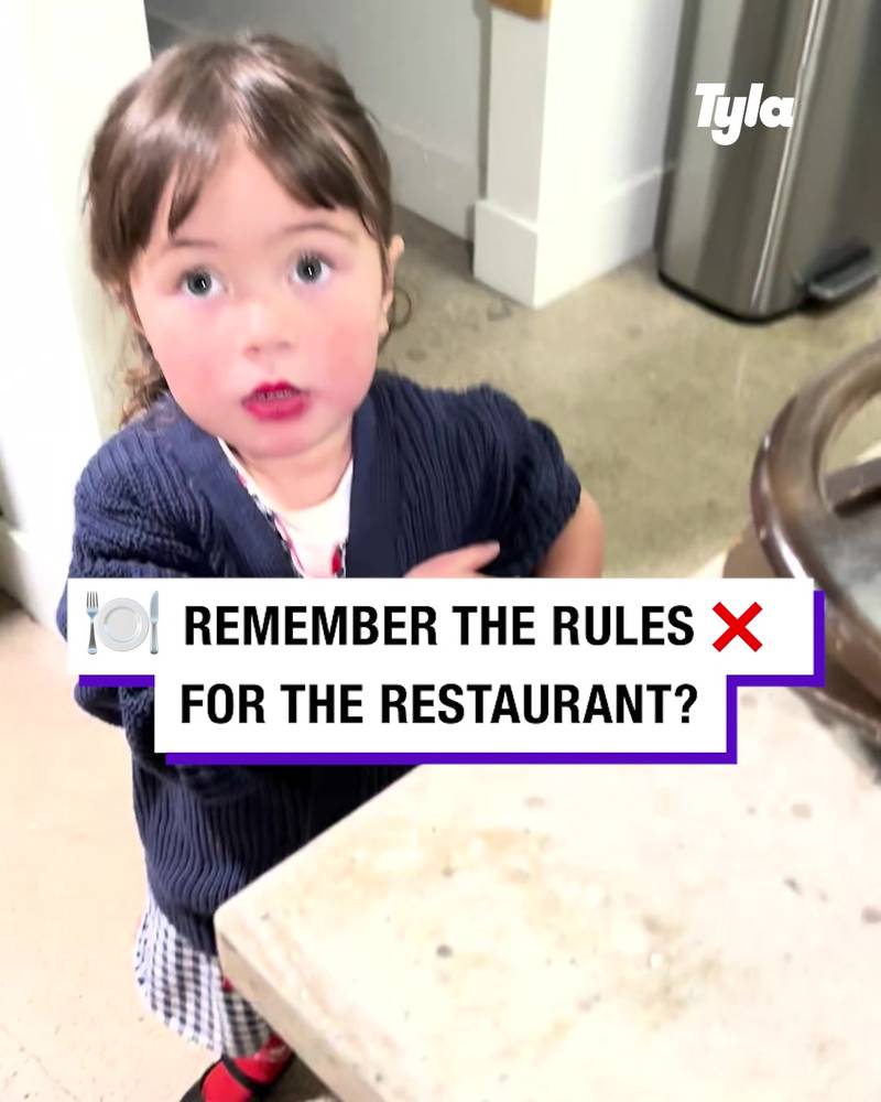 Mum explains restaurant rules to daughter