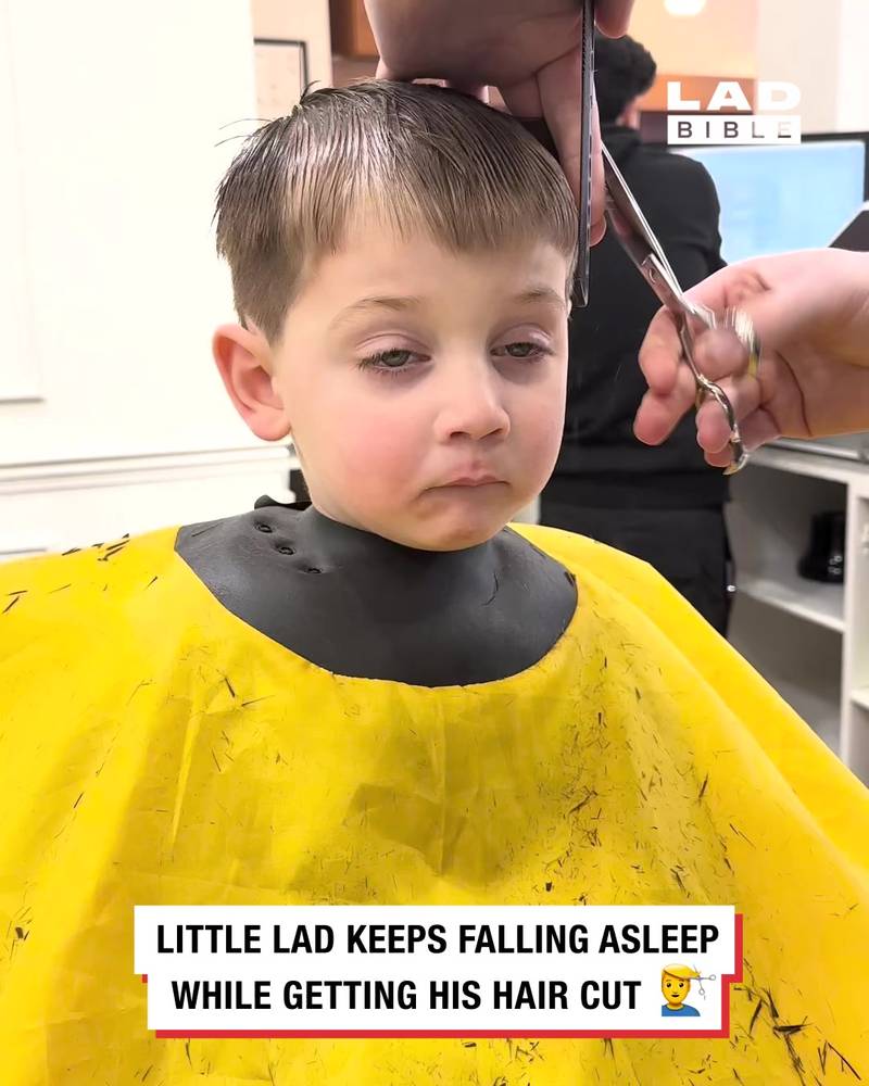 Toddler struggles to stay awake while getting haircut