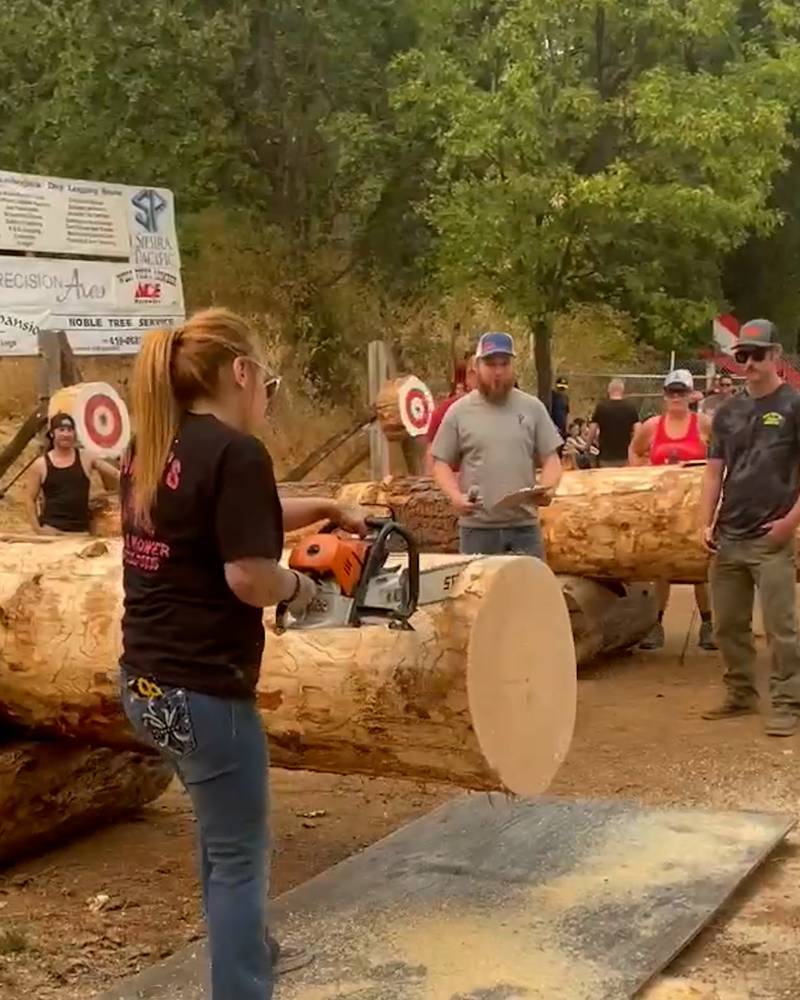 Woman Smashes Log Sawing Competition 🪵