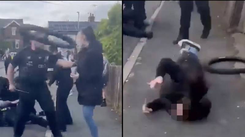 Woman gets knocked out by a tyre after UK street brawl with police gets out of hand