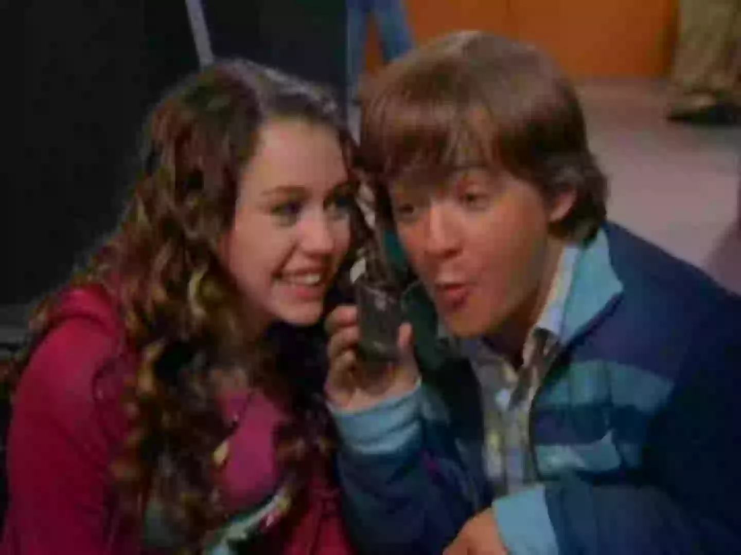 Miley Cyrus and her on-screen brother, Jason Earles, in Hannah Montana (Disney)