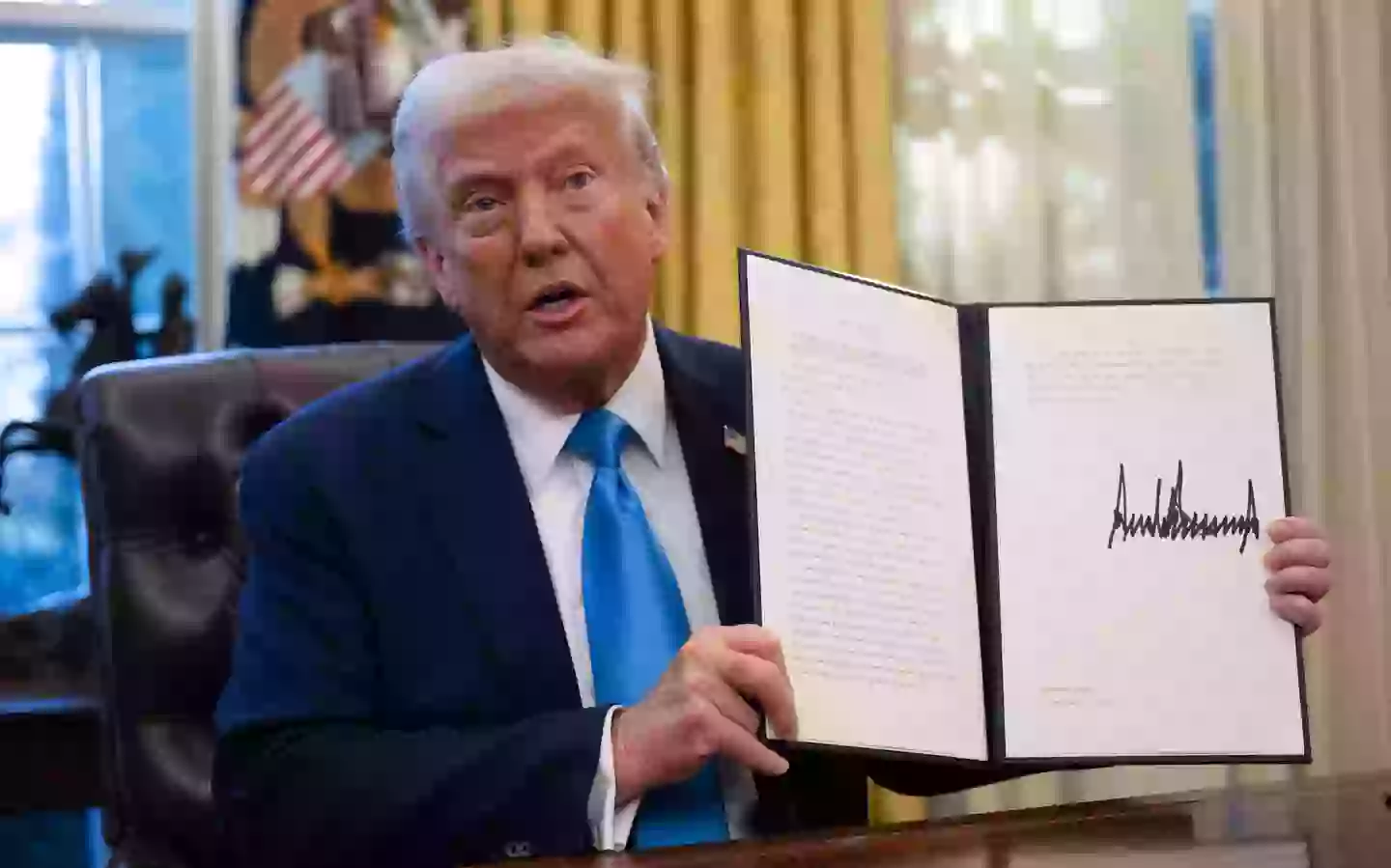 Trump signed several orders (ANDREW CABALLERO-REYNOLDS/AFP via Getty Images)