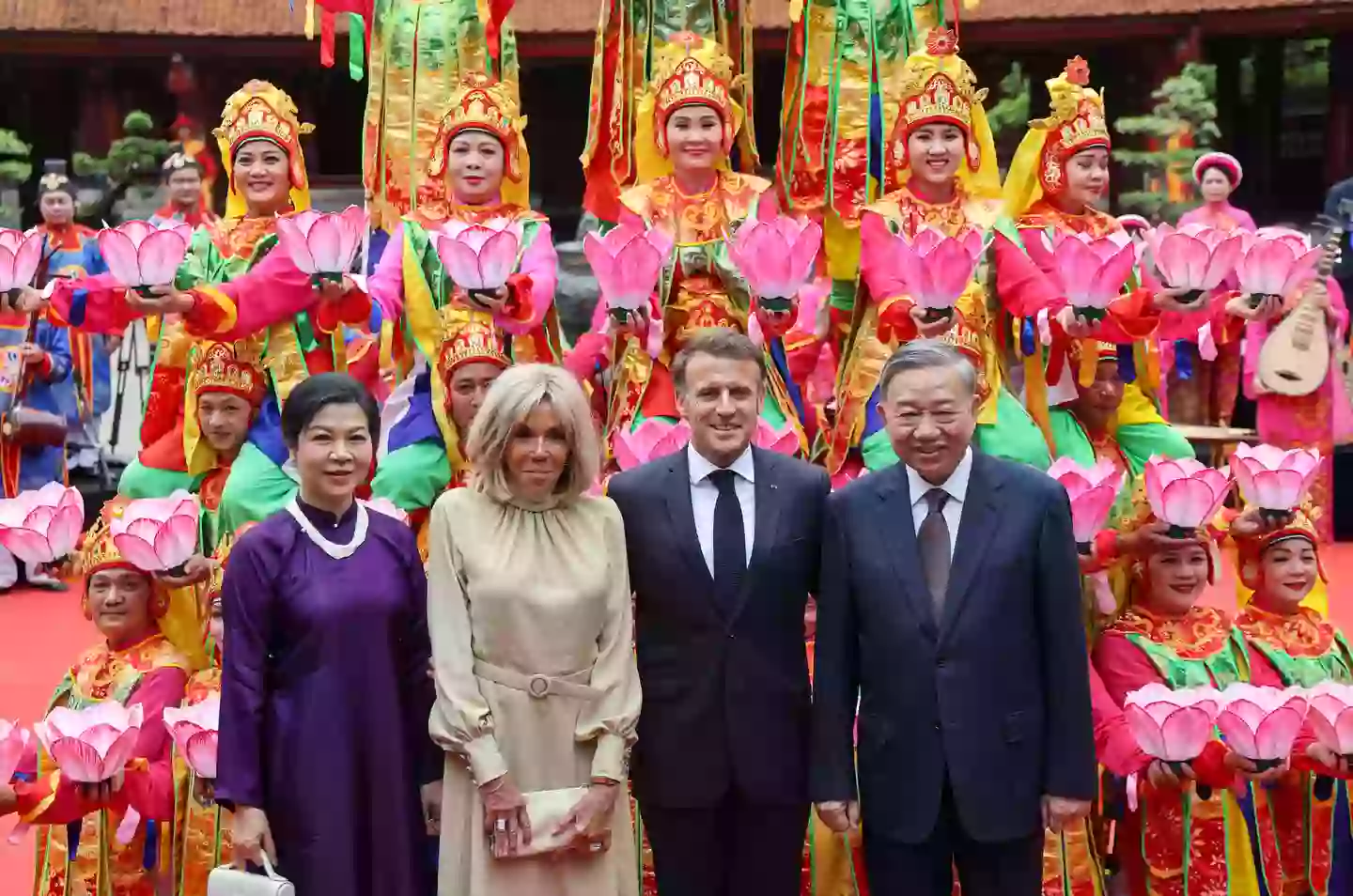 Emmanuel and Brigitte Macron with Vietnam's General Secretary of the Communist Party To Lam and his wife Ngo Phuong Ly in Hanoi (LUDOVIC MARIN/AFP via Getty Images)